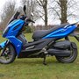 Essai Kymco K-Xct 125cc i : gauche