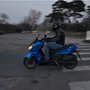Essai Kymco K-Xct 125cc i : en action gauche
